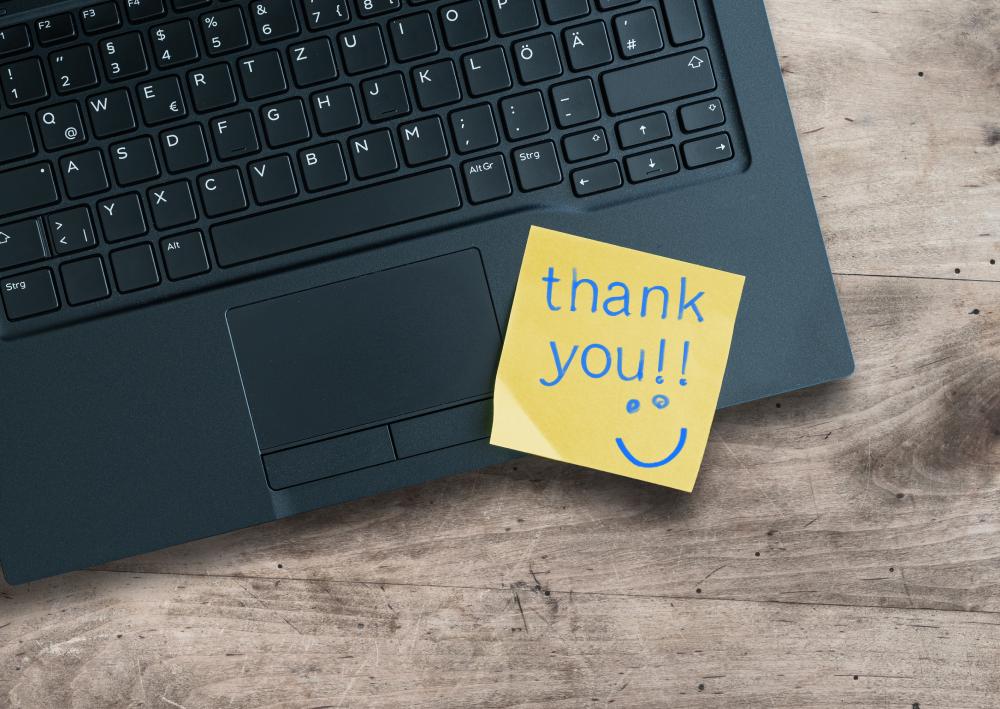 thank you note on laptop staff appreciation week